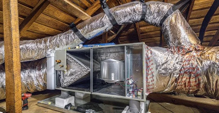 Professionally installed air handler and insulated ductwork in an attic