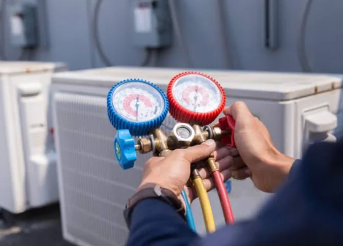 Technician performing AC repair and diagnostics